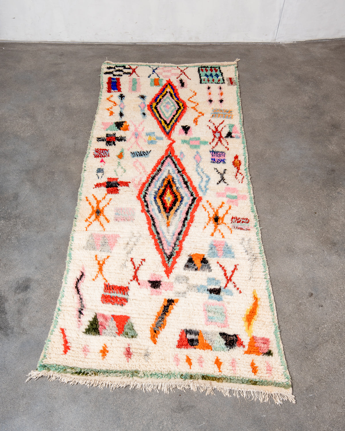 Modern, designer, handcrafted Berber runner rug from Morocco. Vintage carpet with beautiful colours and patterns and fluffy texture.